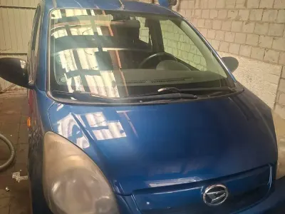 Gebraucht Daihatsu Cuore 70 PS (51 kW) 2010 Blau Kleinwagen