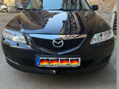 Używany Mazda 6 166 KM (122 kW) 2004 Czarny Kombi