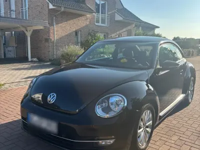 Gebraucht VW Beetle 105 PS (77 kW) 2012 Schwarz Kleinwagen