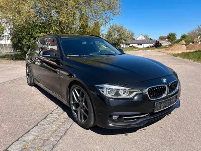 Second-hand BMW 330 Sport Line 258 CP (189 kW) 2016 Negru Break