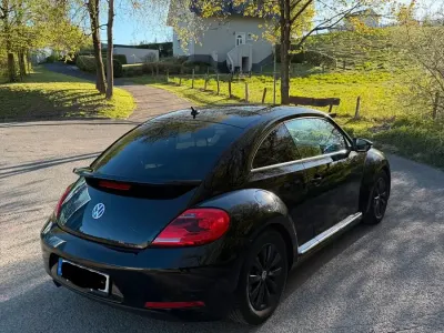Gebraucht VW Beetle Exclusive 105 PS (77 kW) 2013 Schwarz Kleinwagen