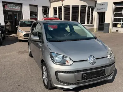 Używany VW up! 60 KM (44 kW) 2012 Beżowy Hatchback