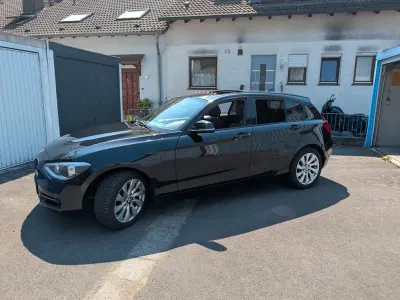 Gebraucht BMW 116 Sport Line 136 PS (100 kW) 2012 Schwarz Kleinwagen