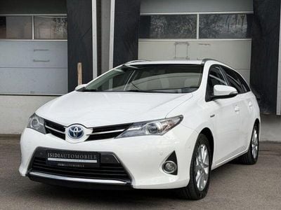 Second-hand Toyota Auris Hybrid Life+ 99 CP (72 kW) 2014 Alb Break