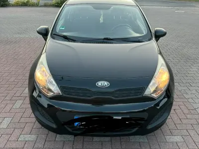 Gebraucht Kia Rio 75 PS (55 kW) 2012 Schwarz Kleinwagen
