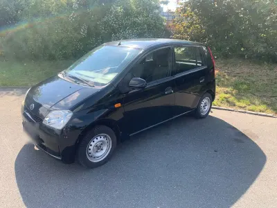 Gebraucht Daihatsu Cuore 69 PS (50 kW) 2007 Schwarz Kleinwagen
