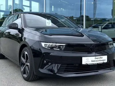 Gebraucht Opel Astra 136 PS (100 kW) 2024 Karbon schwarz metallic Kleinwagen