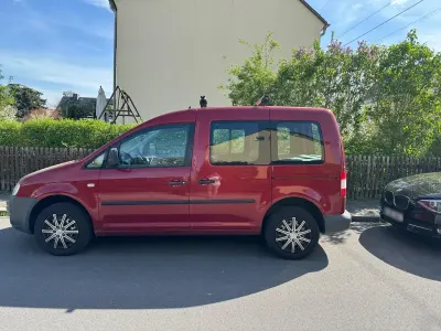 Używany VW Caddy Life 102 KM (75 kW) 2006 Czerwony Minivan