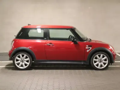 Gebraucht Mini Cooper D Seven 88 PS (64 kW) 2006 Solar red metallic Kleinwagen