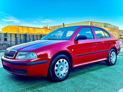 Używany Skoda Octavia 110 KM (80 kW) 2004 Czerwony Sedan/Limuzyna
