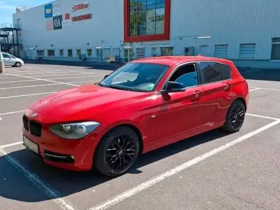 Używany BMW 116 Sport Line 136 KM (100 kW) 2011 Czerwony Hatchback