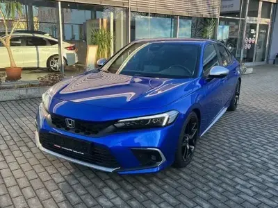 Gebraucht Honda Civic Hybrid 184 PS (135 kW) 2022 Premium crystal blue metallic Limousine