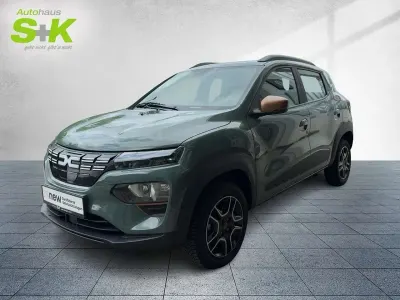 Gebraucht Dacia Spring Extreme 47 kW (65 PS) 2024 Olivgrün Kleinwagen