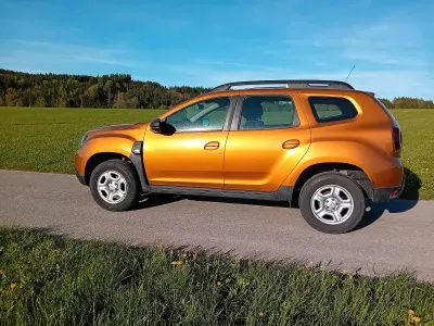 Second-hand Dacia Duster Comfort 115 CP (84 kW) 2019 Portocaliu SUV