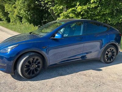 Second-hand Tesla Model Y Long Range AWD 274 kW (373 CP) 2022 Albastru SUV