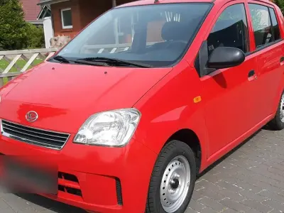 Gebraucht Daihatsu Cuore 59 PS (43 kW) 2006 Rot Kleinwagen