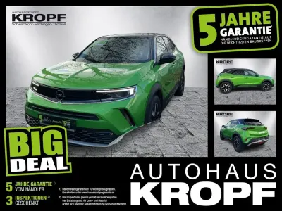 Gebraucht Opel Mokka Elegance 131 PS (96 kW) 2022 Matcha green/ikone gruen SUV