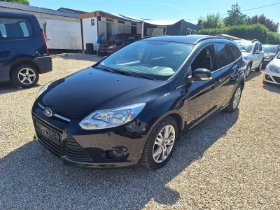 Gebraucht Ford Focus Trend 125 PS (91 kW) 2014 Pantherschwarz metallic Kombi