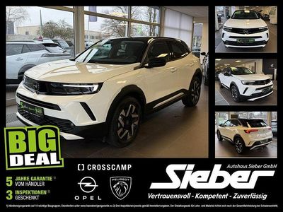 Gebraucht Opel Mokka-e Elegance 100 kW (136 PS) 2023 Lack weiss banquise/typ aussen SUV