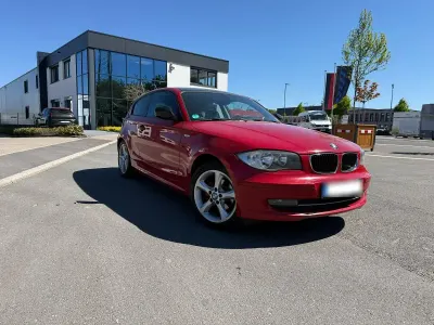 Second-hand BMW 116 Comfort Edition 122 CP (89 kW) 2010 Roșu Hatchback