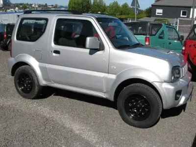 Second-hand Suzuki Jimny 86 CP (63 kW) 2013 Argintiu SUV