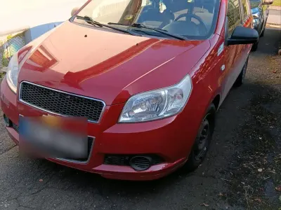Gebraucht Chevrolet Aveo 74 PS (54 kW) 2009 Rot Kleinwagen