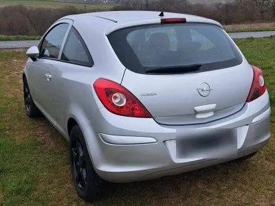 Second-hand Opel Corsa 80 CP (58 kW) 2009 Argintiu Hatchback