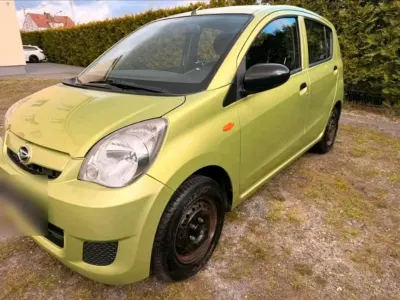 Gebraucht Daihatsu Cuore 70 PS (51 kW) 2007 Grün Kleinwagen