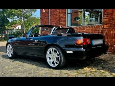 Gebraucht Mazda MX5 90 PS (66 kW) 1996 Schwarz Cabrio