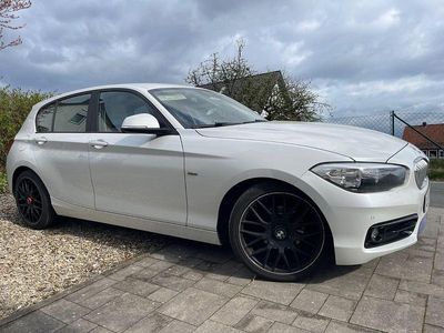 Second-hand BMW 118 Urban Line 150 CP (110 kW) 2017 Alb Hatchback