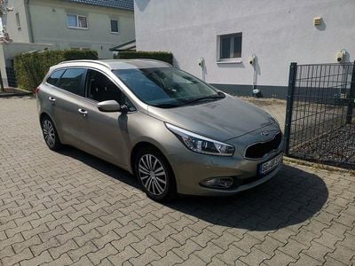 Second-hand Kia Ceed Sportswagon 128 CP (94 kW) 2014 Maro Break