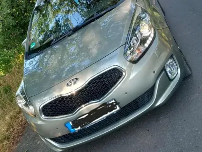 Gebraucht Kia Carens 136 PS (100 kW) 2014 Grau Van / Kleinbus