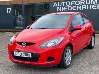 Używany Mazda 2 Inclusive 68 KM (50 kW) 2009 Czerwony Hatchback
