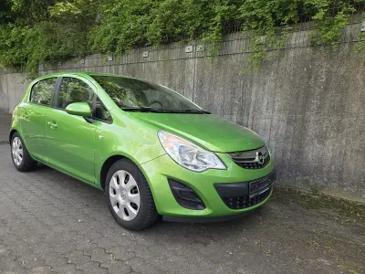 Gebraucht Opel Corsa 87 PS (63 kW) 2013 Grün Kleinwagen