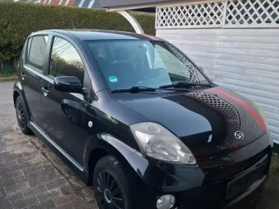 Gebraucht Daihatsu Sirion 87 PS (63 kW) 2006 Schwarz Kleinwagen