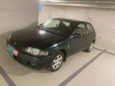 Gebraucht Mazda 323 73 PS (53 kW) 2001 Grün Limousine