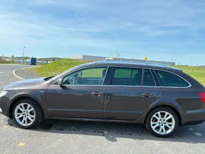 Second-hand Skoda Superb Family 160 CP (117 kW) 2011 Maro Break