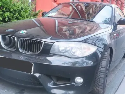Gebraucht BMW 116 122 PS (89 kW) 2008 Schwarz Kleinwagen