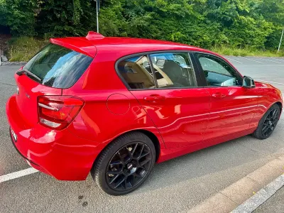 Gebraucht BMW 118 Sport Line 170 PS (125 kW) 2011 Rot Kleinwagen