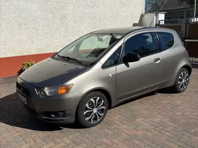 Begagnad Mitsubishi Colt Inform 75 HK (55 kW) 2009 Beige Halvkombi
