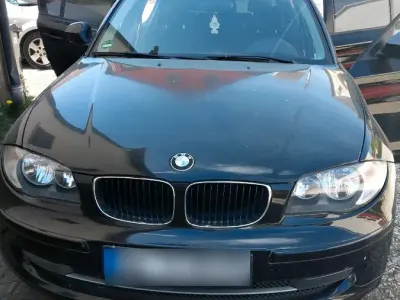 Gebraucht BMW 118 122 PS (89 kW) 2010 Schwarz Kleinwagen