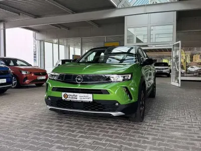 Gebraucht Opel Mokka-e Elegance 100 kW (136 PS) 2022 Matcha green/ikone gruen SUV