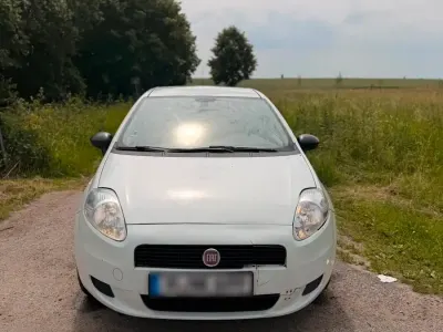 Gebraucht Fiat Grande Punto 65 PS (47 kW) 2012 Weiß Kleinwagen