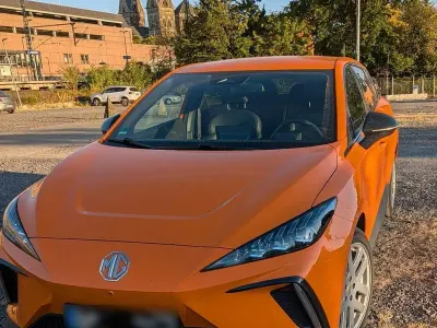Gebraucht MG MG4 EV Luxury 150 kW (204 PS) 2023 Orange Kleinwagen