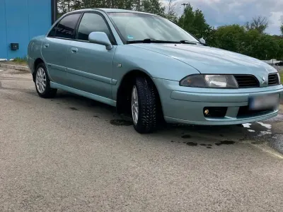 Gebraucht Mitsubishi Carisma 103 PS (75 kW) 2004 Blau Limousine
