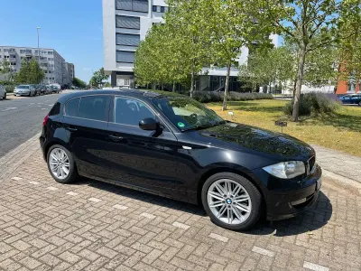 Gebraucht BMW 123 Sport Line 204 PS (150 kW) 2011 Schwarz Kleinwagen