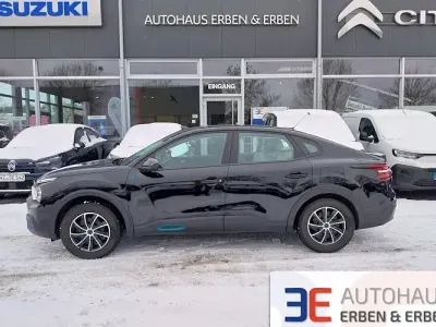 Używany Citroën e-C4 Feel 100 kW (136 KM) 2023 Czarny Sedan/Limuzyna