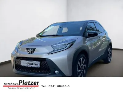 Gebraucht Toyota Aygo X Comfort 72 PS (52 kW) 2023 4u9)/ black mica (209) (beige SUV