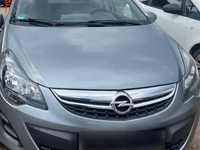 Usado Opel Corsa Edition 87 HP (63 kW) 2014 Cinzento Citadino