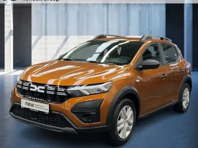 Second-hand Dacia Sandero Essentiel 101 CP (74 kW) 2024 Portocaliu Berlinǎ